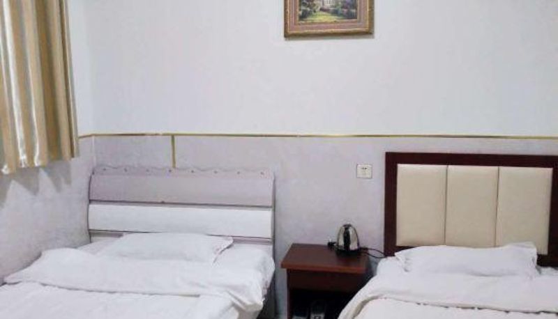 Zimmer - Walker Express Hotel
