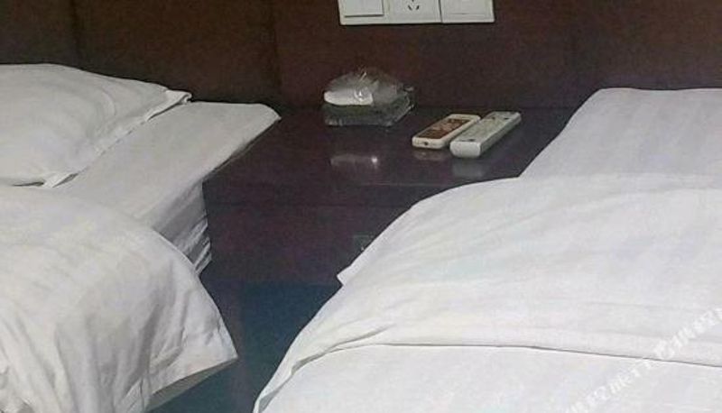 Zimmer - Nanling Yijia Express Hotel