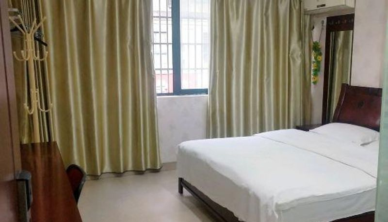 Zimmer - Nanling Yijia Express Hotel
