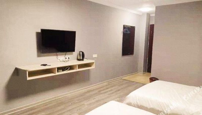 Zimmer - Quanjiaowei'ai Theme Hotel