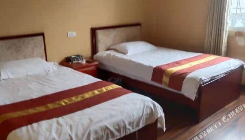 Zimmer - Dafang Sanhe Hotel