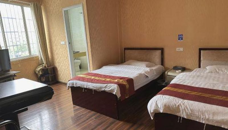 Zimmer - Dafang Sanhe Hotel