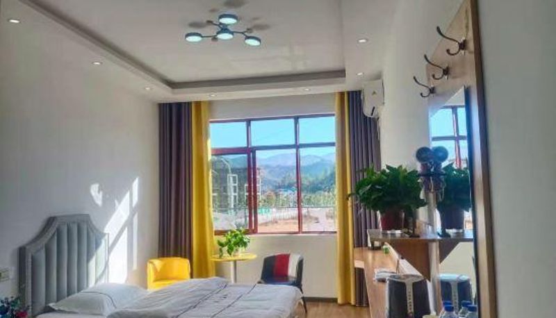 Zimmer - Dayao Liangdian Hotel