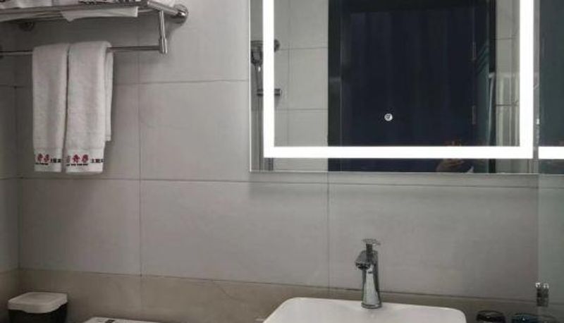 Kamer - Xincaishang Youth Theme Hotel