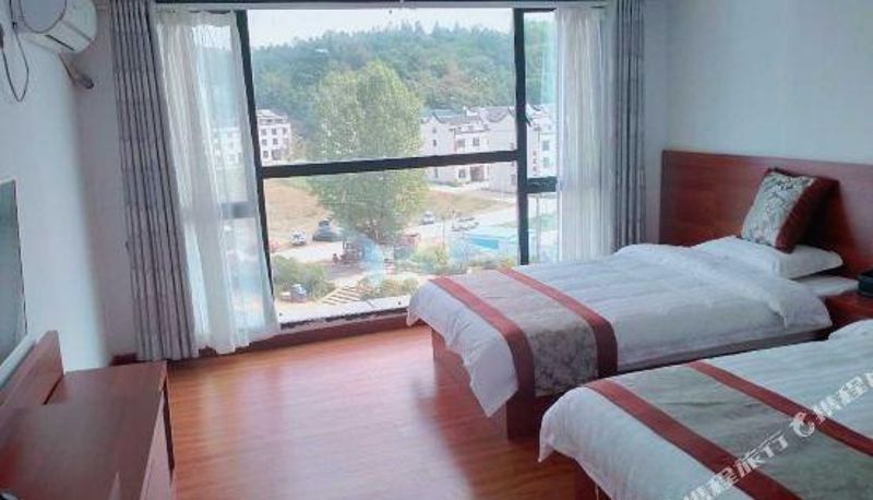Zimmer - Jinzhai Huipeng Jiayuan Hotel