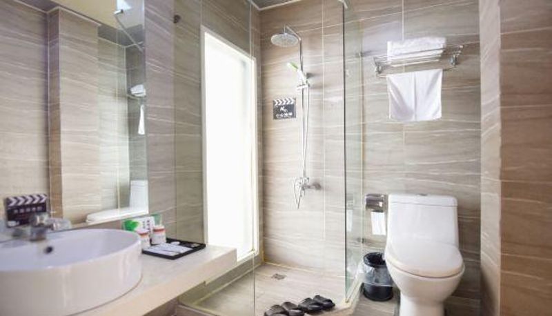 Habitación - Liyang Roman Holiday Hotel (Sanma Commercial Plaza)