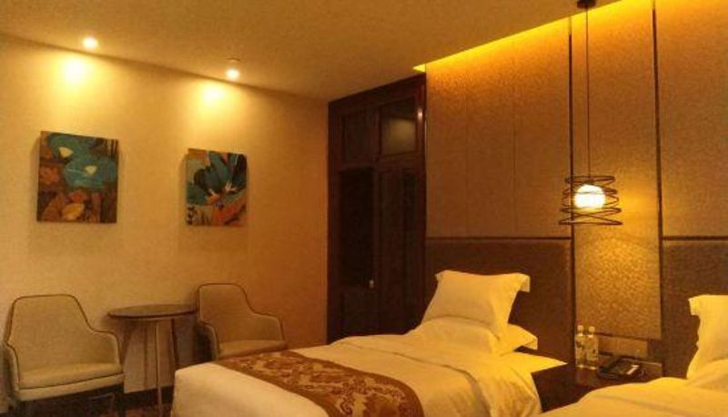 Habitación - Jiwei Boutique Hotel