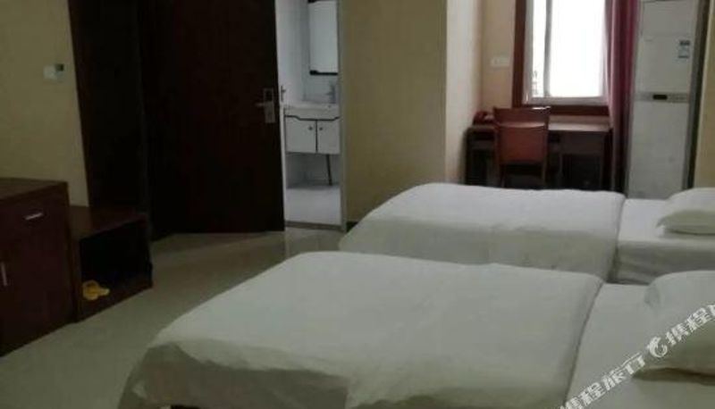 Zimmer - Gushi Longxing Hotel