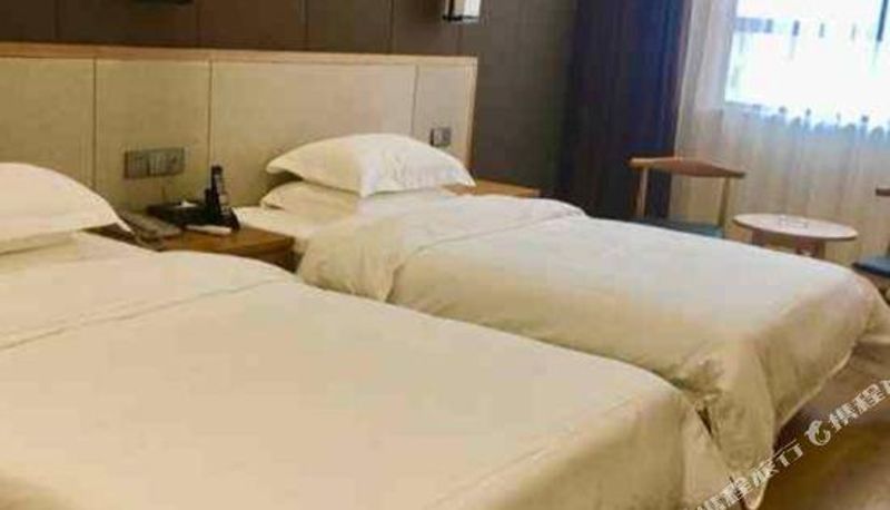 Zimmer - Xinzheng Enhui Hotel