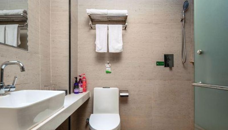 Habitación familiar - Huayiju Hotel (Xinzheng Xias International College Xueyuan Road)