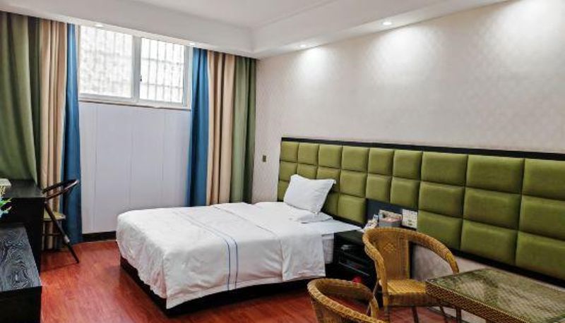 Zimmer - Huayiju Hotel (Xinzheng Xias International College Xueyuan Road)
