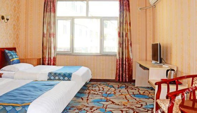 Habitación - Jingxin Business Hotel