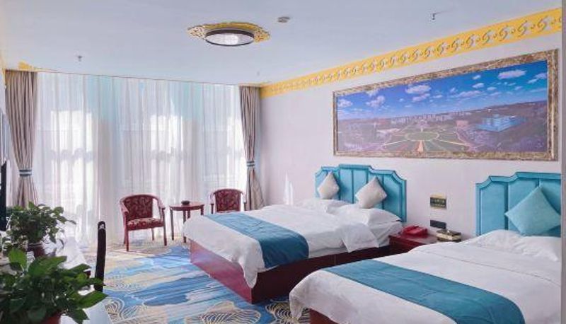 Zimmer - Home Inn Paibai Yun Hotel (Ordos Wanzheng Road Mingshi Garden Shop)