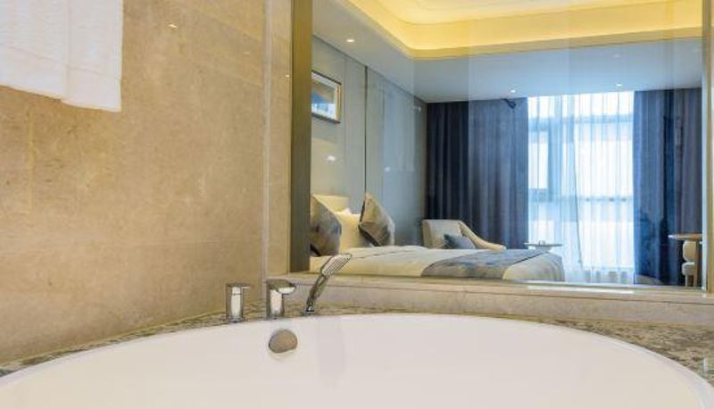 Zimmer - Ramada Plaza by Wyndham Dongxing Citycenter