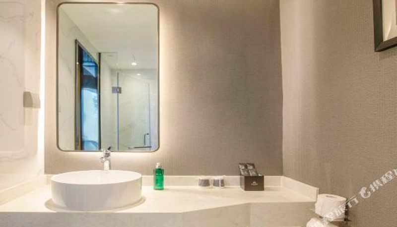 Camera - Magnotel Hotel (Dongxing Guomen Port)