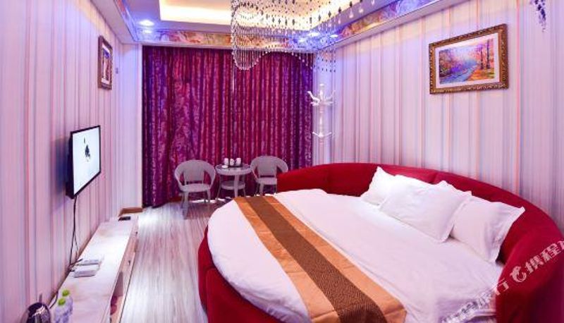Zimmer - Luliang Jiajie Theme Hotel