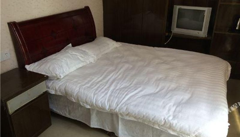 Zimmer - beimenqiao Hotel