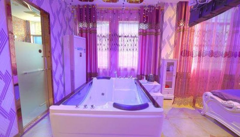Zimmer - Liping Aiwei Theme Hotel