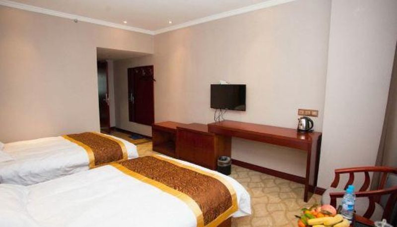 Habitación - Shiji Guomao Holiday Hotel