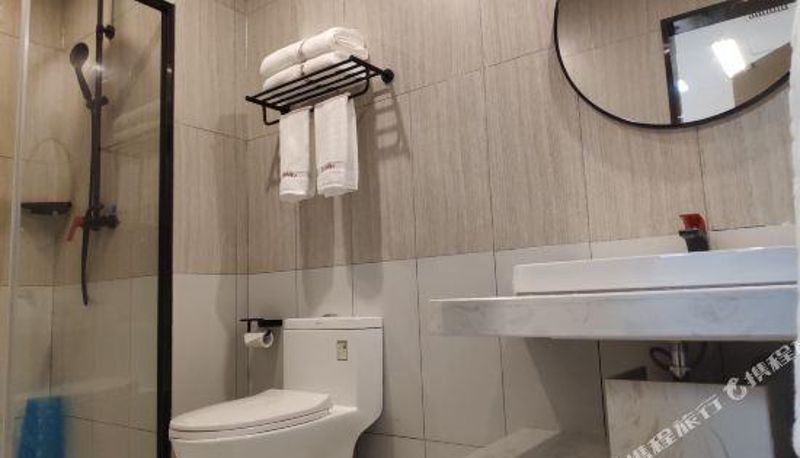 Camera - Meishan East Slope District) Thank Inn Chain Hotel (Yuanjing Building