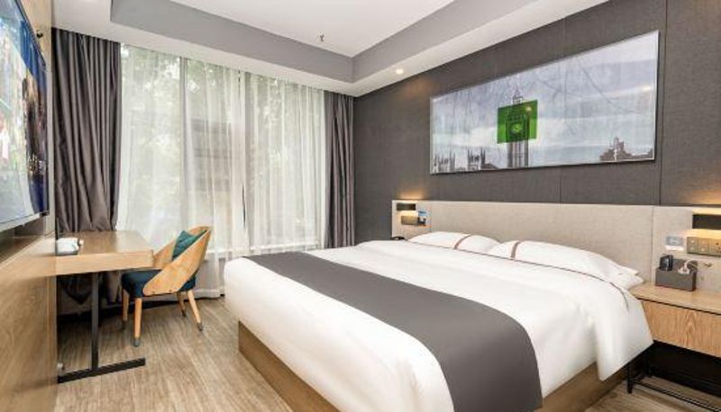 Camera - Meishan East Slope District) Thank Inn Chain Hotel (Yuanjing Building