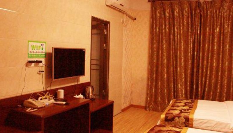 Habitación - Meishan Century Boutique Hotel