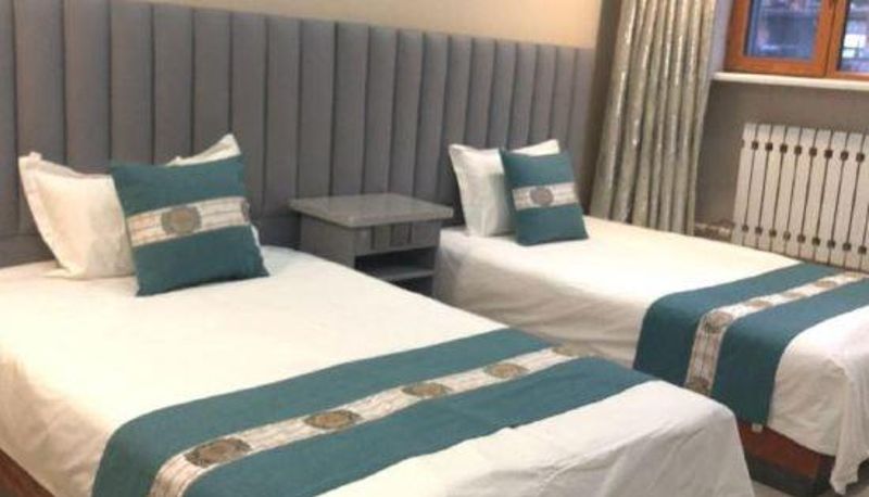 Chambre Business - Xinyouru Business Hotel (Yakeshi Branch)
