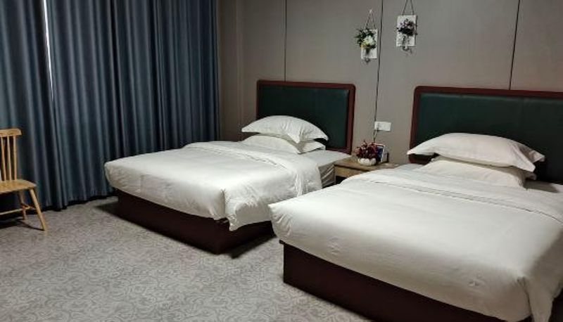 Zimmer - Longnan Haoyijia Theme Hotel