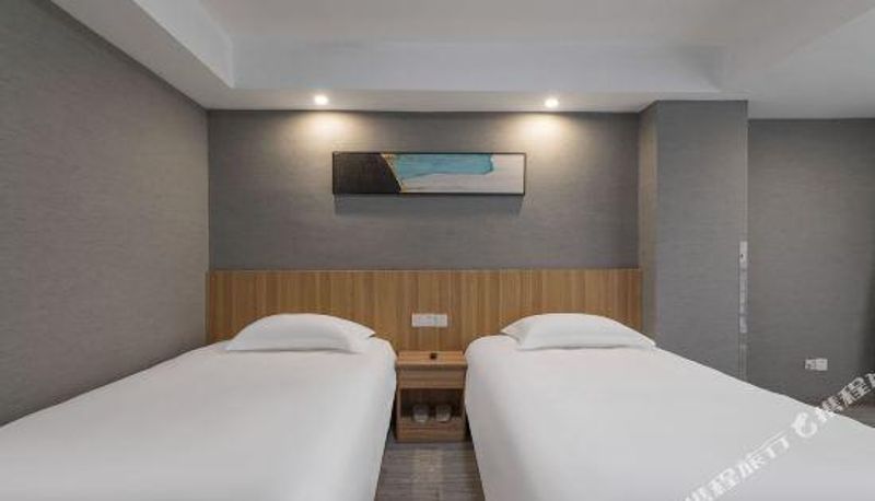 Zimmer - Nanyuan E-home (Changxing South Station Eight Hundred Partner Store)
