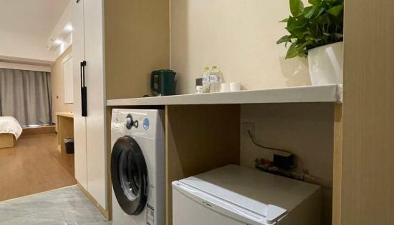 Zimmer - Qiuguo LOFT Smart Cinema Apartment (Rizhao China Resources Wanxianghui Branch)
