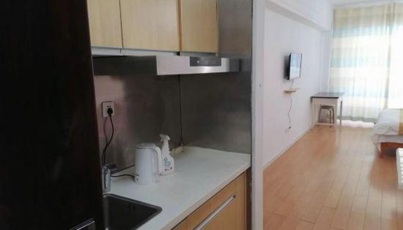 Zimmer - Rizhao Qichi Boutique Business and Tourism Apartment (China Resources MIXC Store)