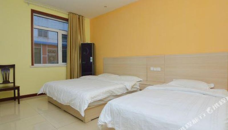 Camera per famiglia - Kelinning Chain Hotel (Jiaozhou Railway Station Store)