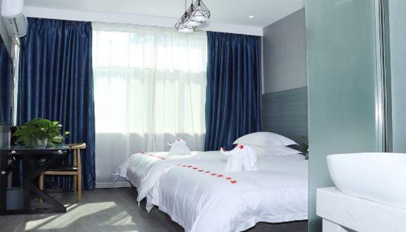 Habitación - Wuyi Heyi Boutique Hotel