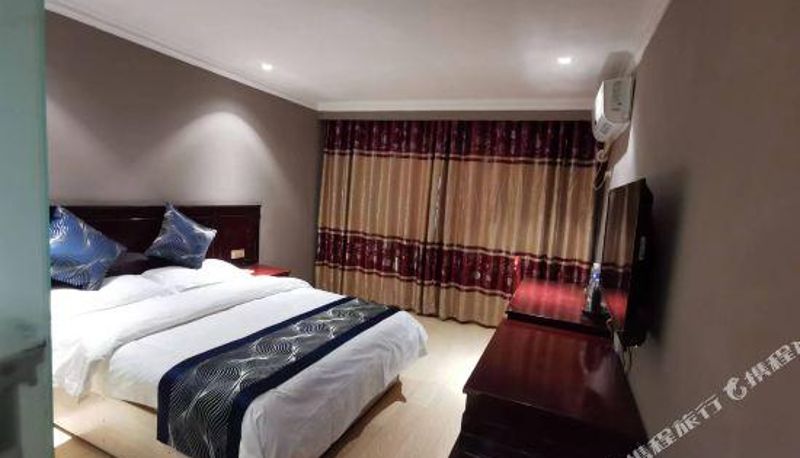 Zimmer - Yinan Business Hotel (Xianning Hubei Institute of Technology Branch)