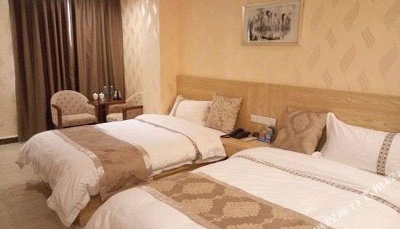 Zimmer - Junyue Hotel (Guiyuan Shifang)