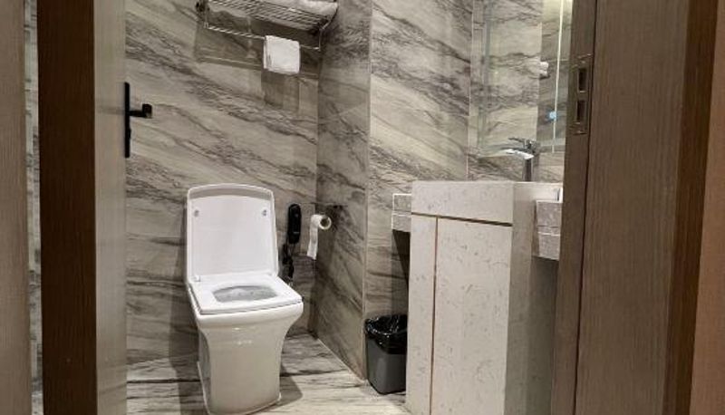 Habitación con balcón - Gaozhou Nanhao Selected Hotel