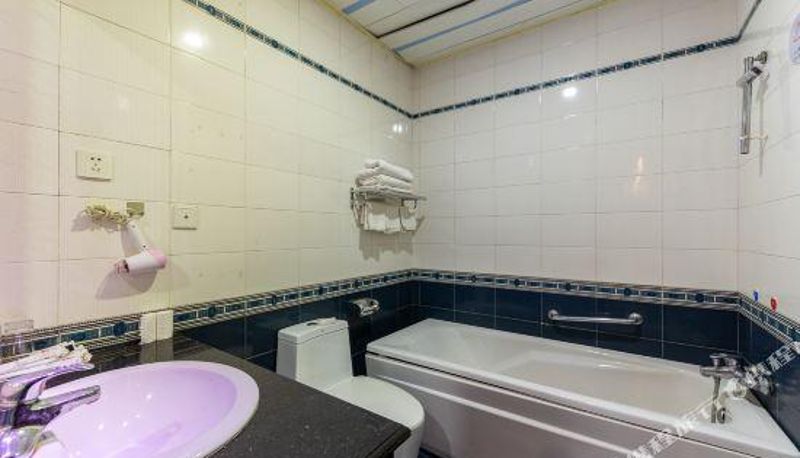 Habitación familiar - Zhangye Hexiang Hengji Boutique Hotel