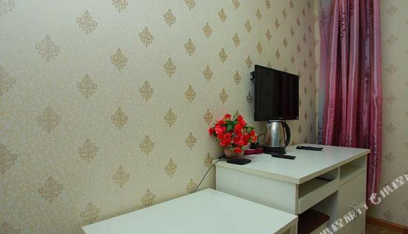 Zimmer - Shangri La Dalin Business Hotel