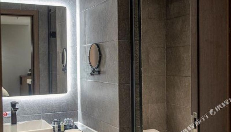 Habitación - Millennium Golden Wing Hotel (Xuecheng Guangming West Road store)