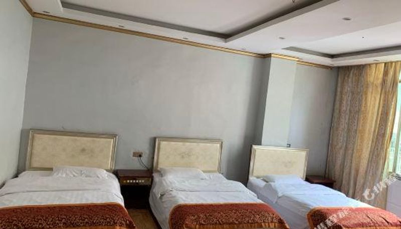 Habitación - Qiteng Business Hotel