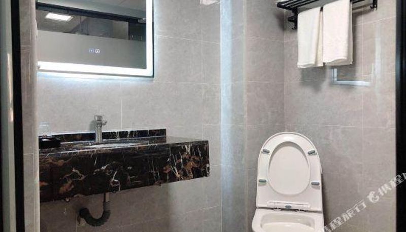 Chambre - Xinjie Apartment Hotel