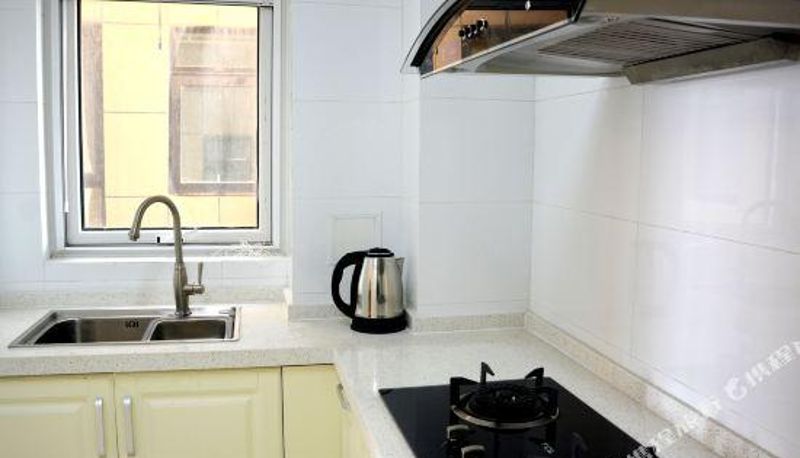 Pokój z widokiem na morze - Yantai Kangxinju Apartment