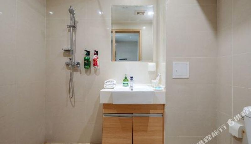 Zimmer - Jiusu Anbai CR Resort Apartment (Yantai University Store)