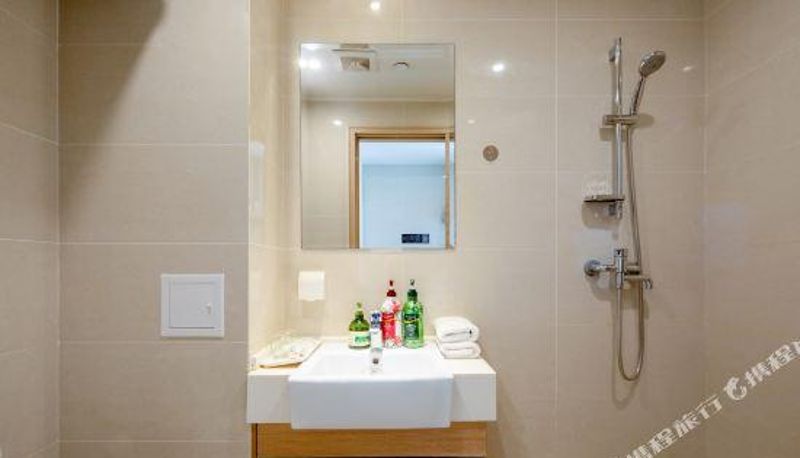 Zimmer - Jiusu Anbai CR Resort Apartment (Yantai University Store)