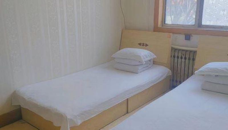 Zimmer - Da Ben Express Hotel (Yantai Railway Station Store)