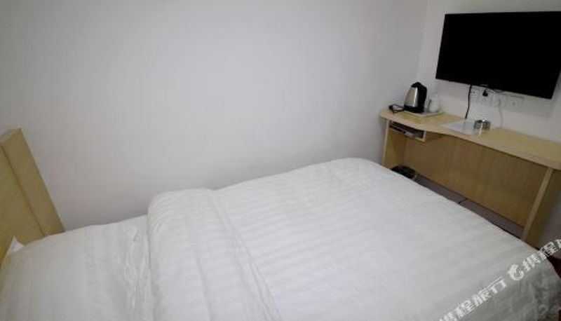 Zimmer - Da Ben Express Hotel (Yantai Railway Station Store)