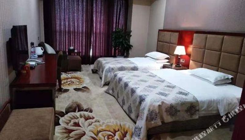 Familienzimmer - Sunshine Holiday Hotel