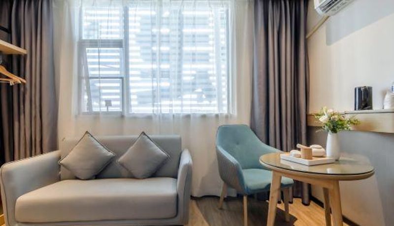 Habitación - City Convenience Hotel (Wuzhou Sanqi City Rose Lake Park)