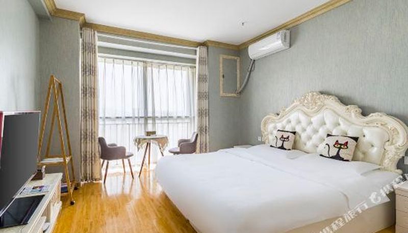 Pokój z widokiem na góry - Tuyuan Holiday Apartment (Weihai Railway Station Hanlefang West Street)