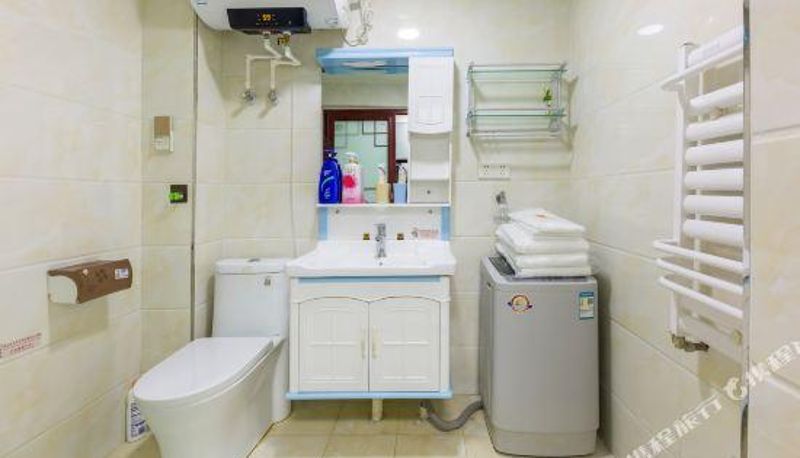Pokój z widokiem na morze - Tuyuan Holiday Apartment (Weihai Railway Station Hanlefang West Street)
